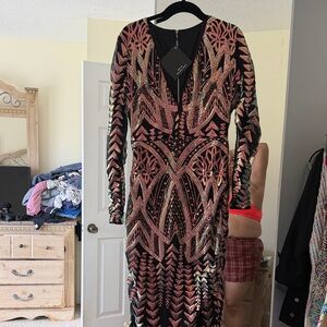 Elegant Black and Gold Embellished Dress